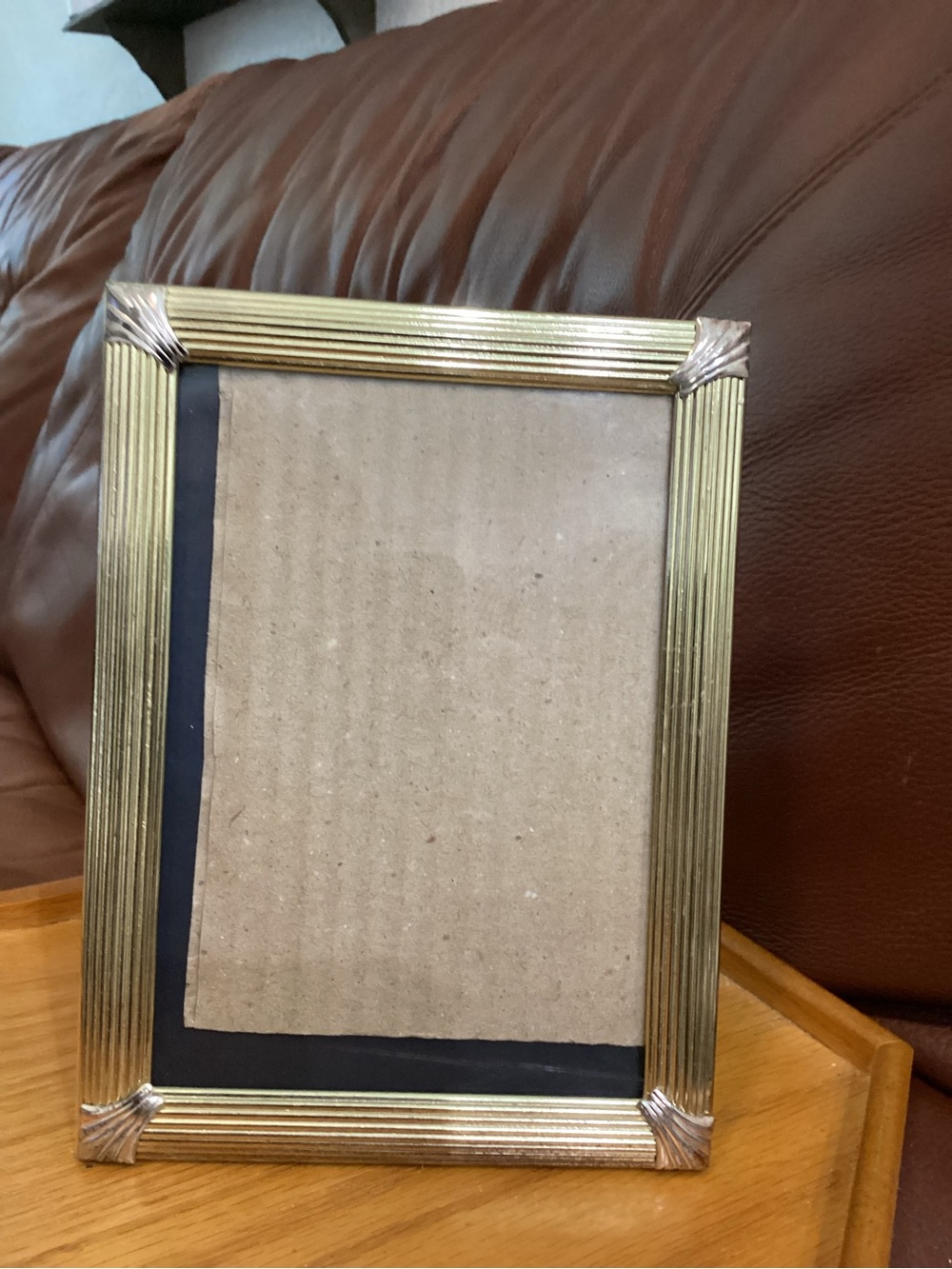 Gold Ribbed Photo Frame with silver accents holds a 5x7